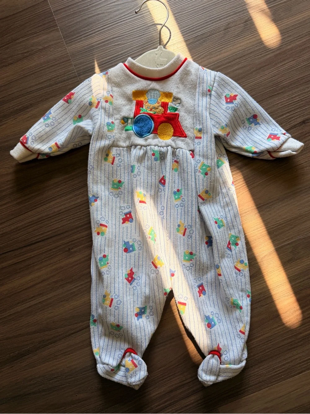 Little Me White Footed One-Piece with Colorful Train Applique